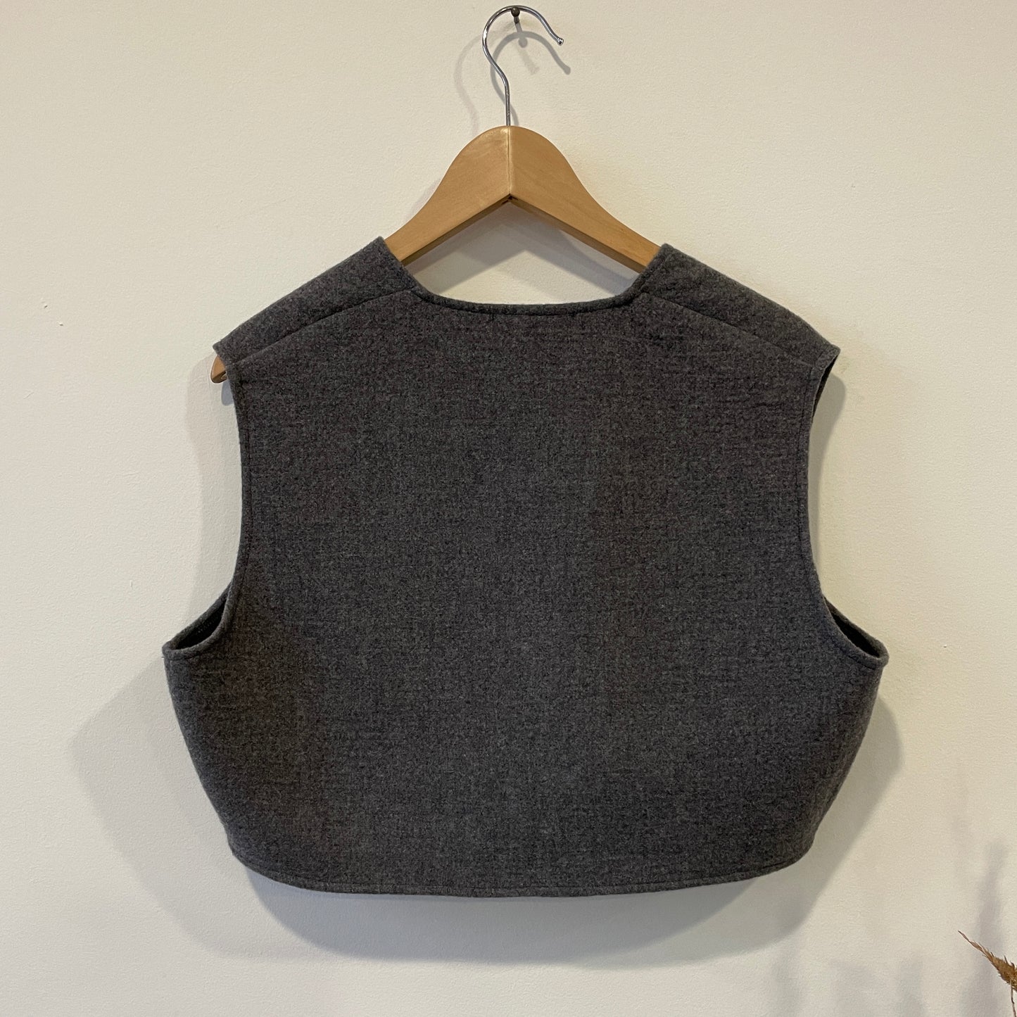 Gilet cropped in lana