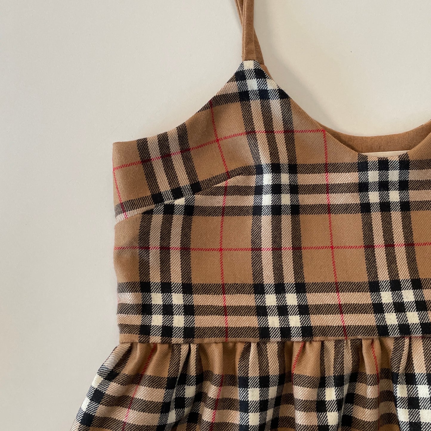 Abito tartan con arriccio